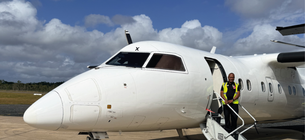 Pilot next to his plane